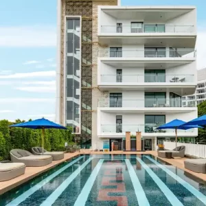 Mera Mare Hotel in Pattaya, a partner hotel of Fairways of Eden, featuring a modern design, relaxing pool area, and convenient location for golf travelers.