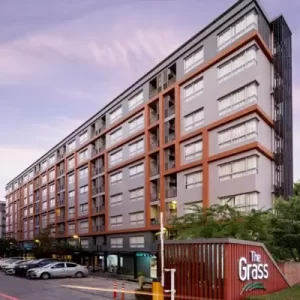 The Grass Serviced Suites, an affordable hotel in Pattaya, offering modern accommodations and a convenient location for golf travelers.