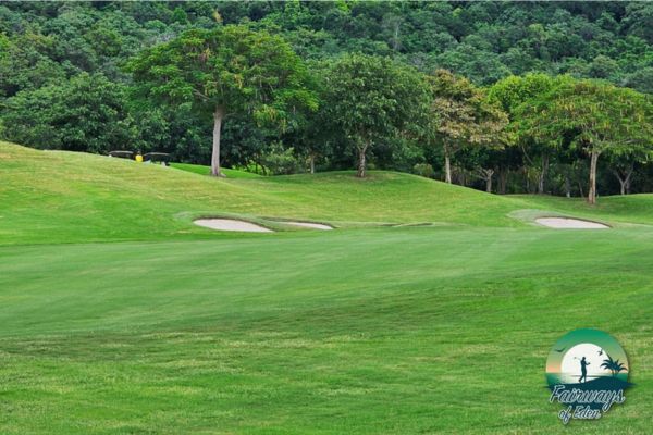 Sloped fairway with multiple bunkers at Black Mountain Golf Club in Thailand