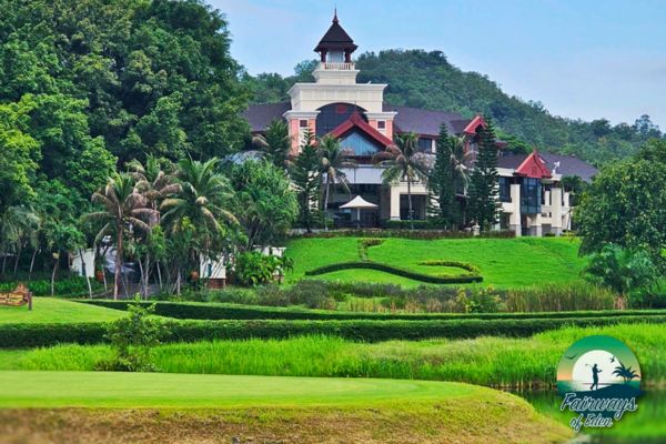 Clubhouse view across the fairway at Springfield Royal Country Club surrounded by greenery